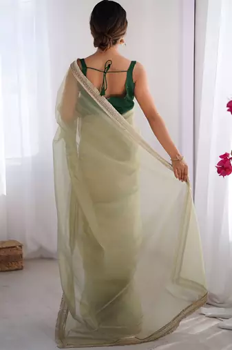 pista stylish gold net graceful girlie saree