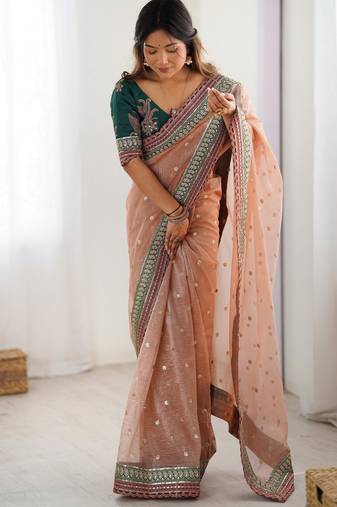 peach color banarasi crush fabric graceful partywear sequins embroidered saree