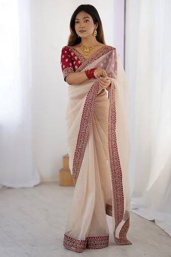 chiku color banarasi crush fabric graceful partywear sequins embroidered saree