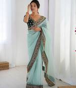 sea green color banarasi crush fabric graceful partywear sequins embroidered saree