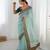 sea green color banarasi crush fabric graceful partywear sequins embroidered saree