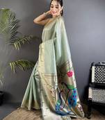 peacock & floral motifs pale blue tissue paithani saree