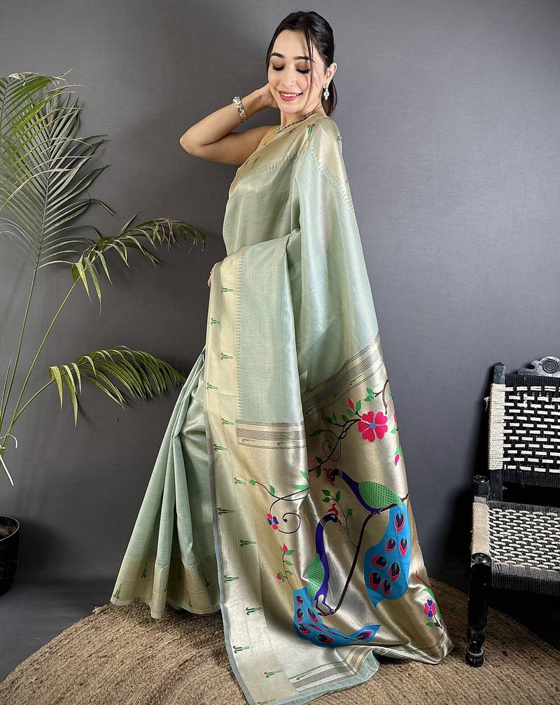 peacock & floral motifs pale blue tissue paithani saree