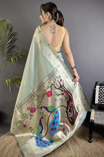 peacock & floral motifs pale blue tissue paithani saree