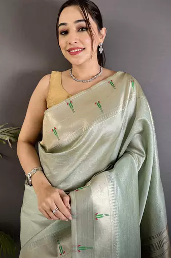 peacock & floral motifs pale blue tissue paithani saree