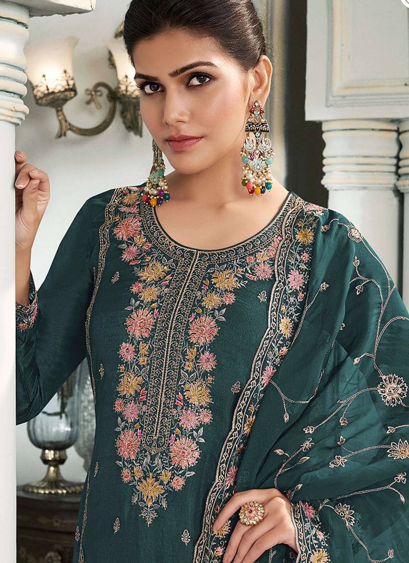 Dark green moonga silk embroidered pant style suit