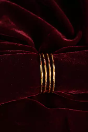 Ribbed high-polish gold bangles