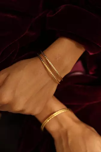 Textured gold stacking bangles