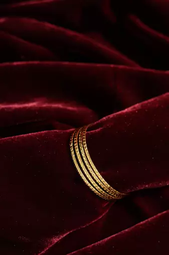 Textured gold stacking bangles