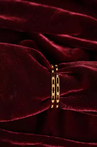 Geometric cut-out diamond bangle