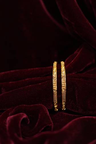 Patterned gold eternity bangles