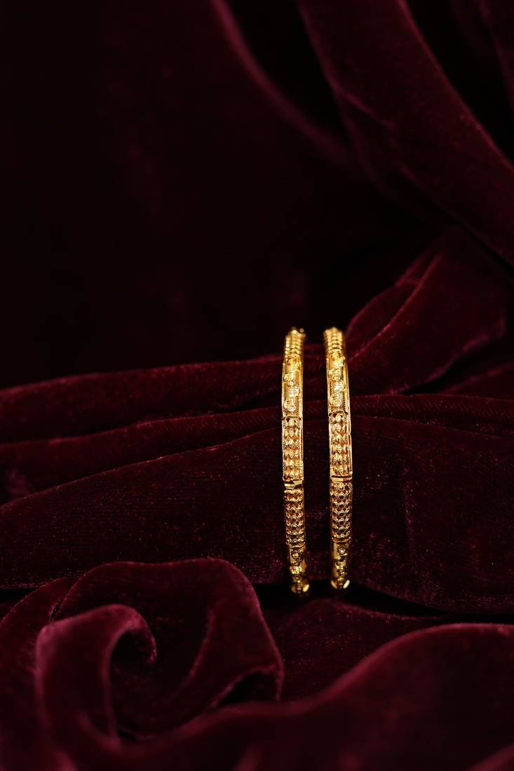 Patterned gold eternity bangles
