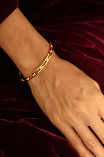 Geometric cut-out diamond bangle