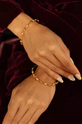 Intricate filigree gold bangles