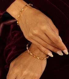 Intricate filigree gold bangles