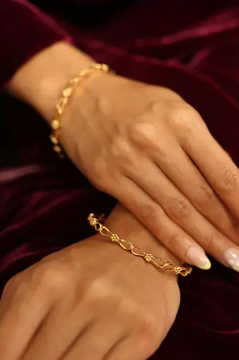 Intricate filigree gold bangles