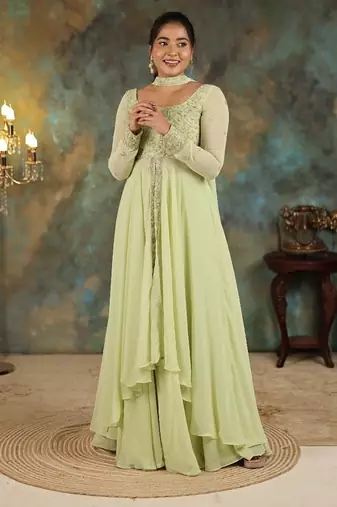 Lime green georgette slit anarkali paired with skirt and choker dupatta