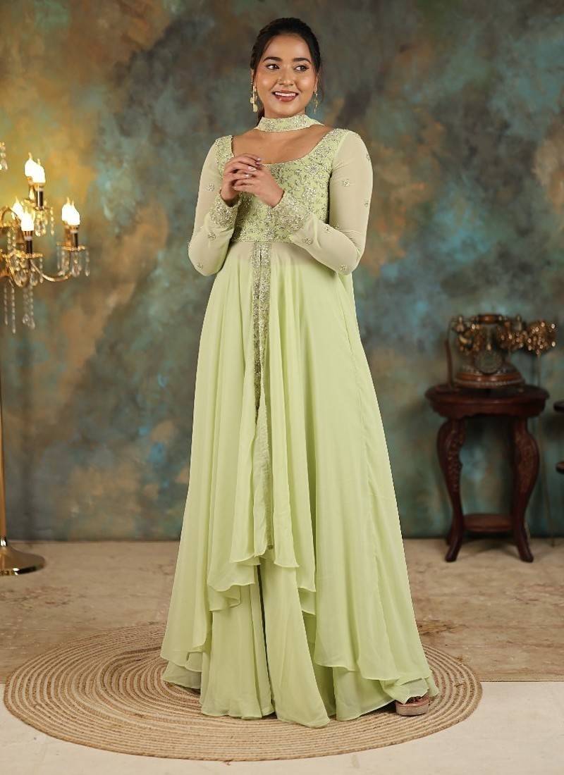 Lime green georgette slit anarkali paired with skirt and choker dupatta