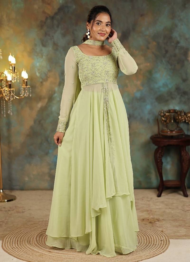 Lime green georgette slit anarkali paired with skirt and choker dupatta