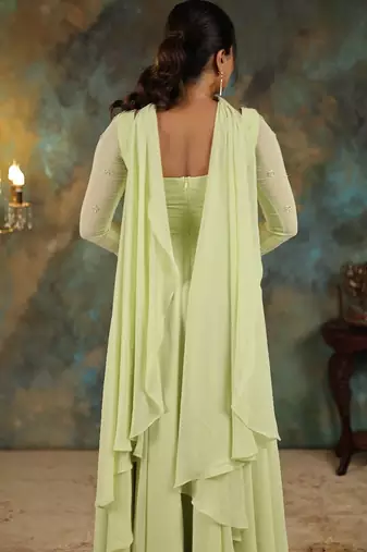 Lime green georgette slit anarkali paired with skirt and choker dupatta