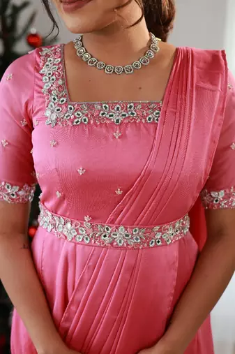 Pink ruffled drape dress with hand embroidered mirror work
