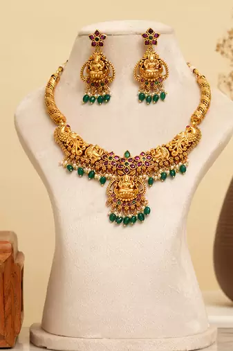 Gold plated green stones temple necklace set