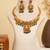 Gold plated green stones temple necklace set