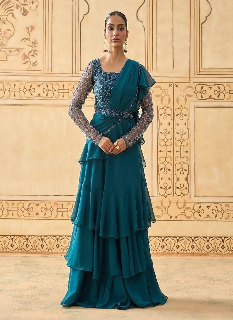 TEAL BLUE LAYERED LEHENGA WITH BEAD WORK BLOUSE AND BELT