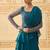 TEAL BLUE LAYERED LEHENGA WITH BEAD WORK BLOUSE AND BELT