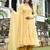Smooth yellow leherya tired anarkali