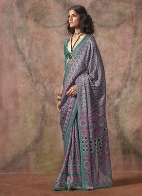 Turquoise ajrakh print satin georgette sarees 1