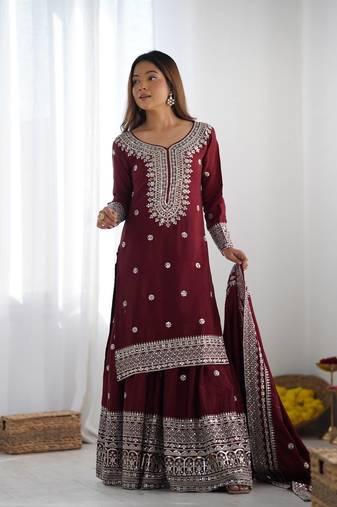 Women maroon sequins , zari, coding & thread embroidered work silk kurta set
