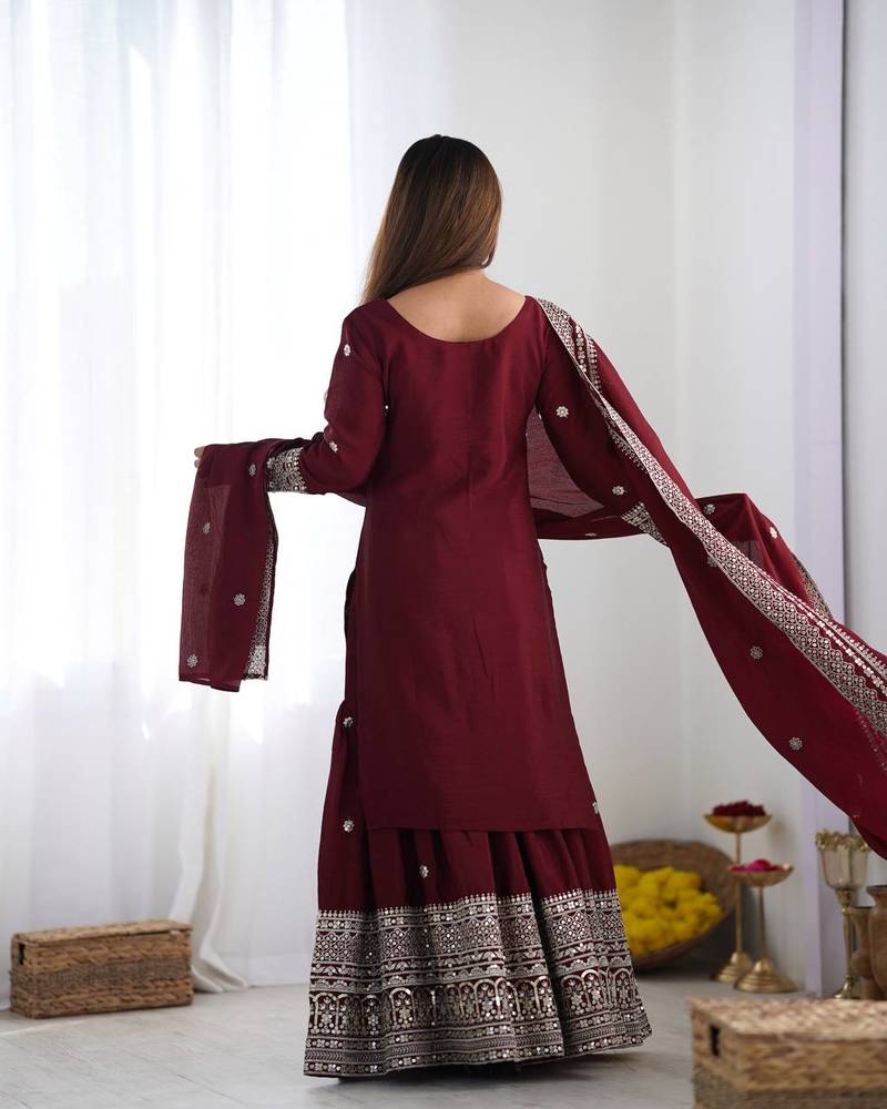 Women maroon sequins , zari, coding & thread embroidered work silk kurta set
