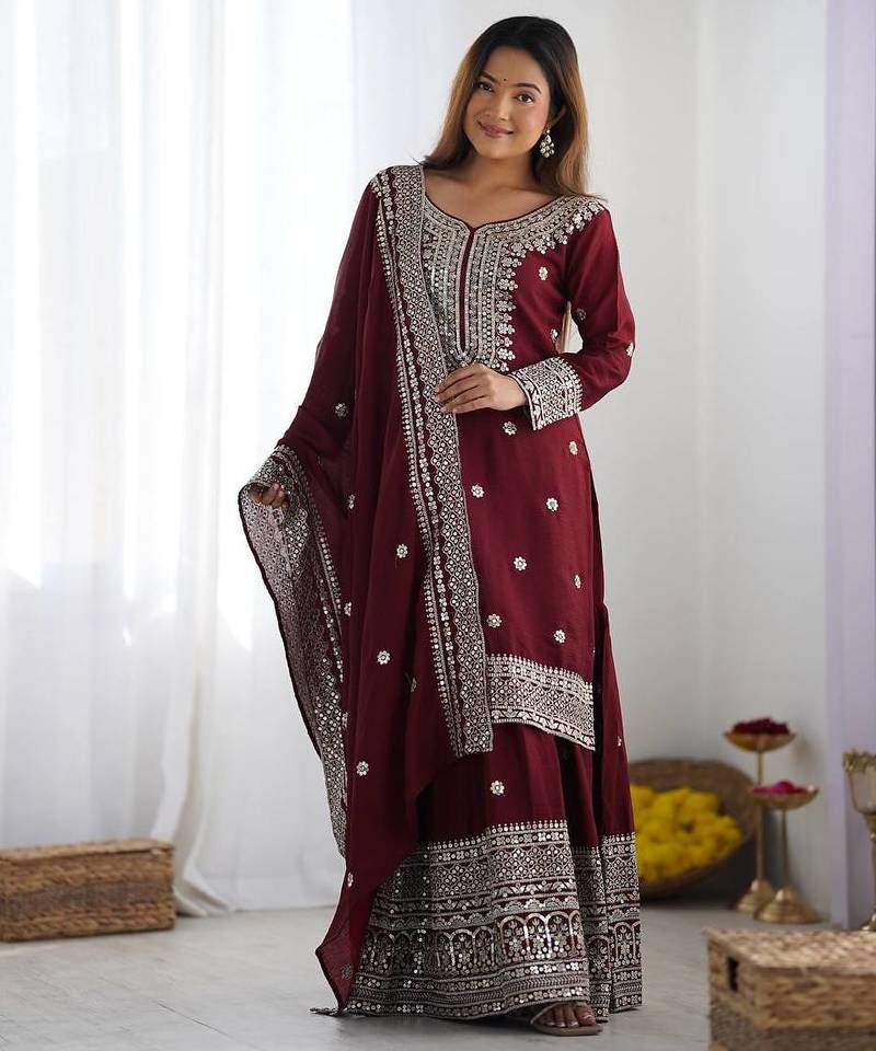 Women maroon sequins , zari, coding & thread embroidered work silk kurta set