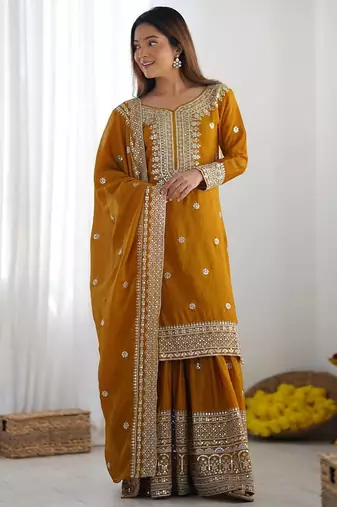 Women musturd sequins , zari, coding & thread embroidered work silk kurta set