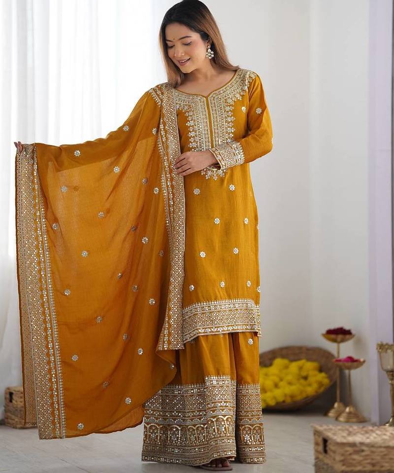 Women musturd sequins , zari, coding & thread embroidered work silk kurta set