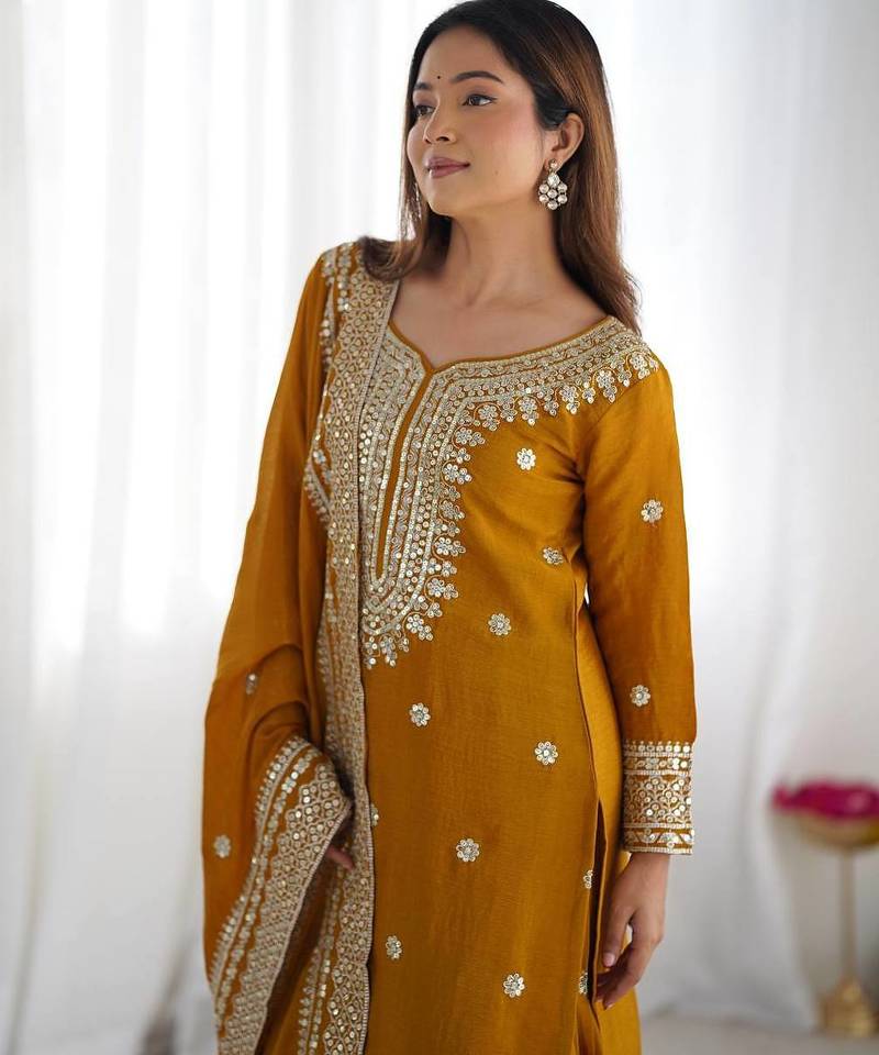 Women musturd sequins , zari, coding & thread embroidered work silk kurta set