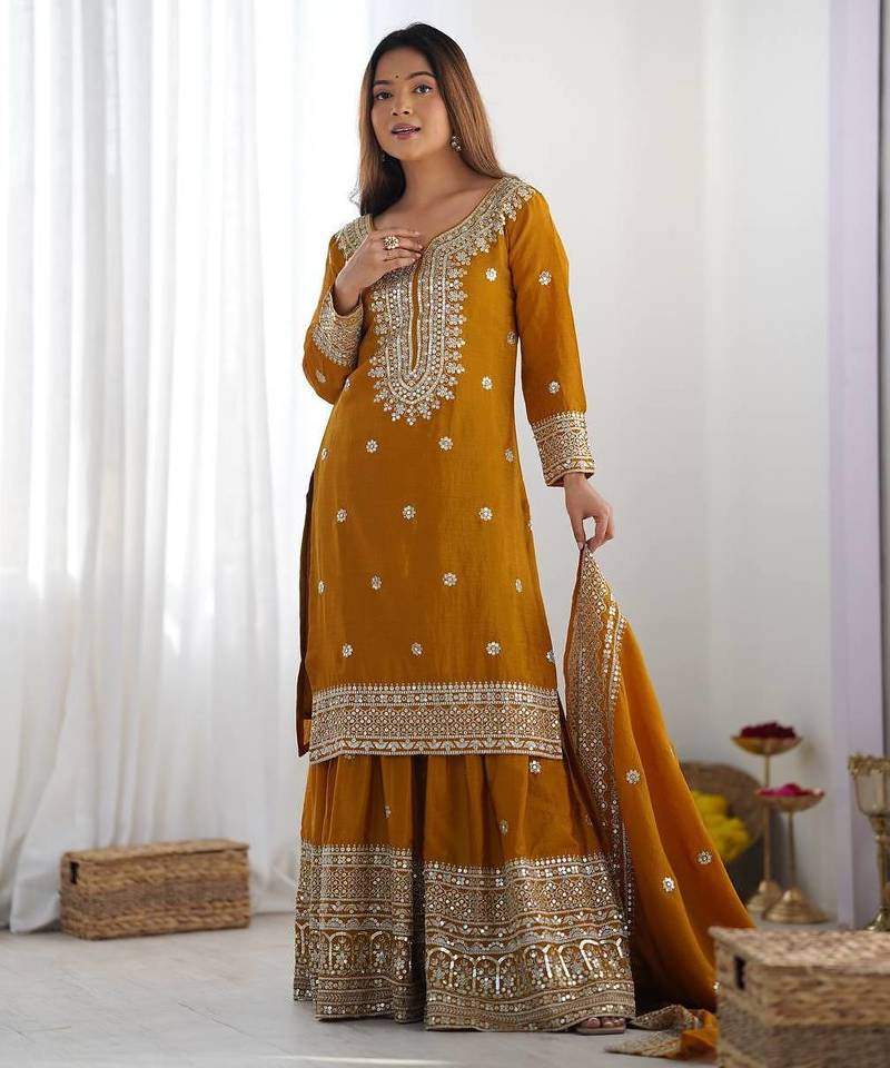 Women musturd sequins , zari, coding & thread embroidered work silk kurta set