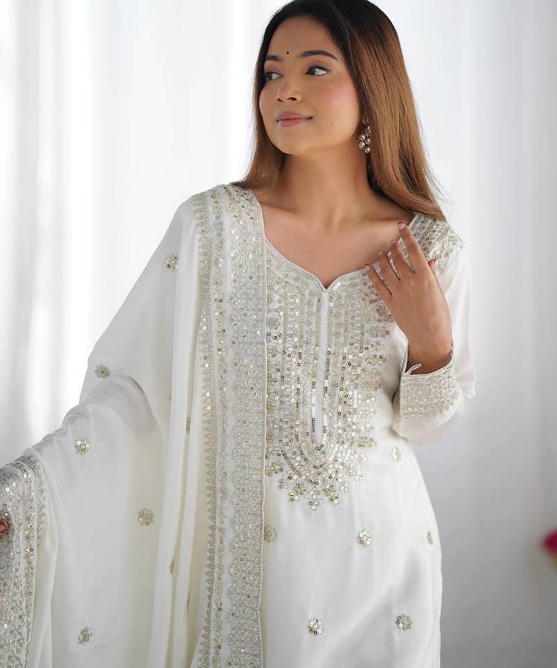 Women white sequins , zari, coding & thread embroidered work silk kurta set
