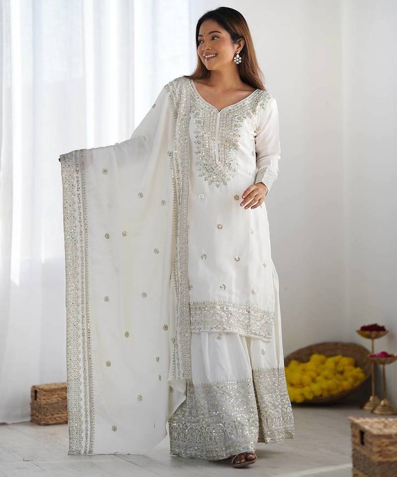 Women white sequins , zari, coding & thread embroidered work silk kurta set