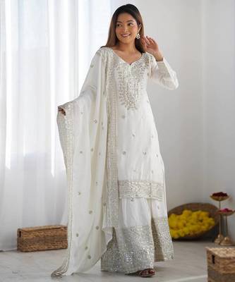 Women white sequins zari coding & thread embroidered work silk blend kurta set 1