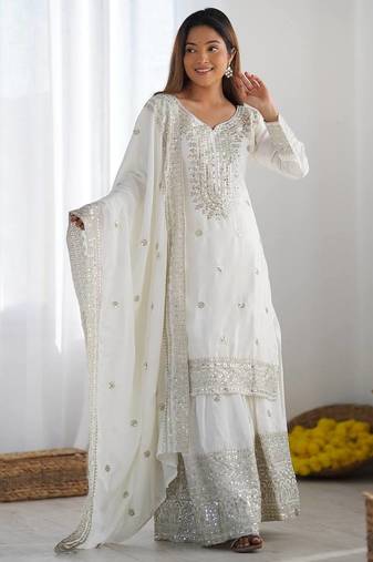 Women white sequins , zari, coding & thread embroidered work silk kurta set