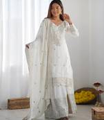Women white sequins , zari, coding & thread embroidered work silk kurta set