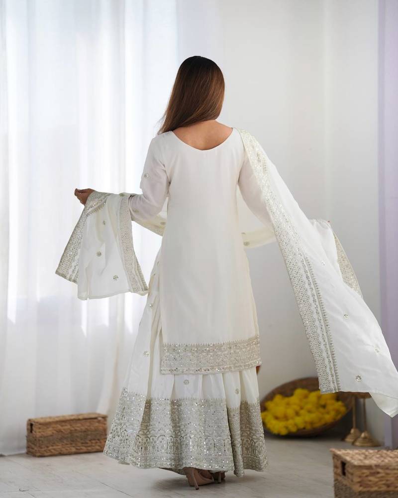 Women white sequins , zari, coding & thread embroidered work silk kurta set