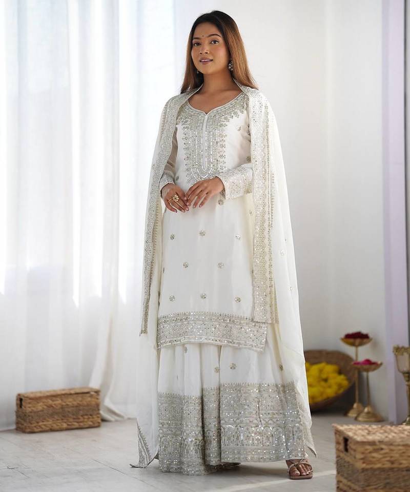 Women white sequins , zari, coding & thread embroidered work silk kurta set