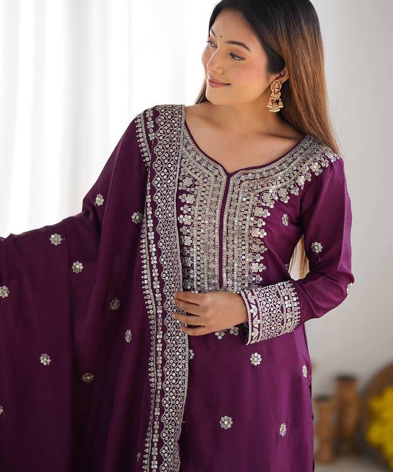 Women wine sequins , zari, coding & thread embroidered work silk kurta set