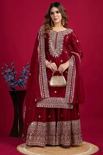 Women maroon sequins , zari, coding & thread embroidered work silk kurta set