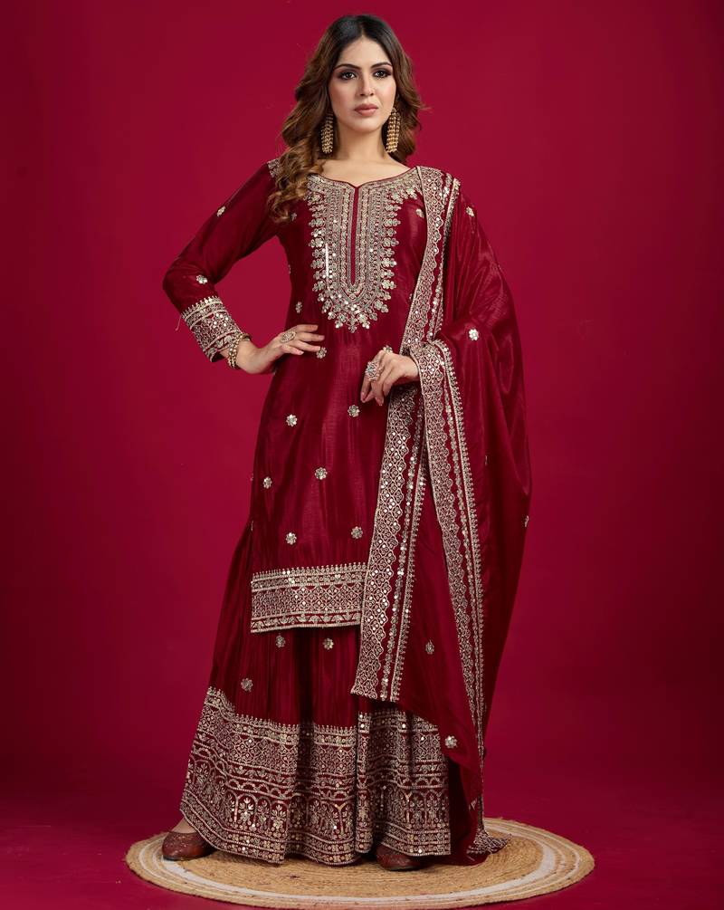 Women maroon sequins , zari, coding & thread embroidered work silk kurta set