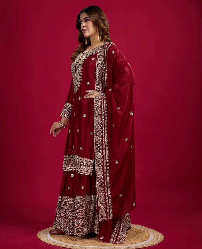 Women maroon sequins , zari, coding & thread embroidered work silk kurta set