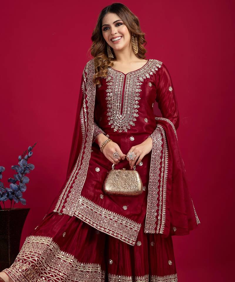 Women maroon sequins , zari, coding & thread embroidered work silk kurta set
